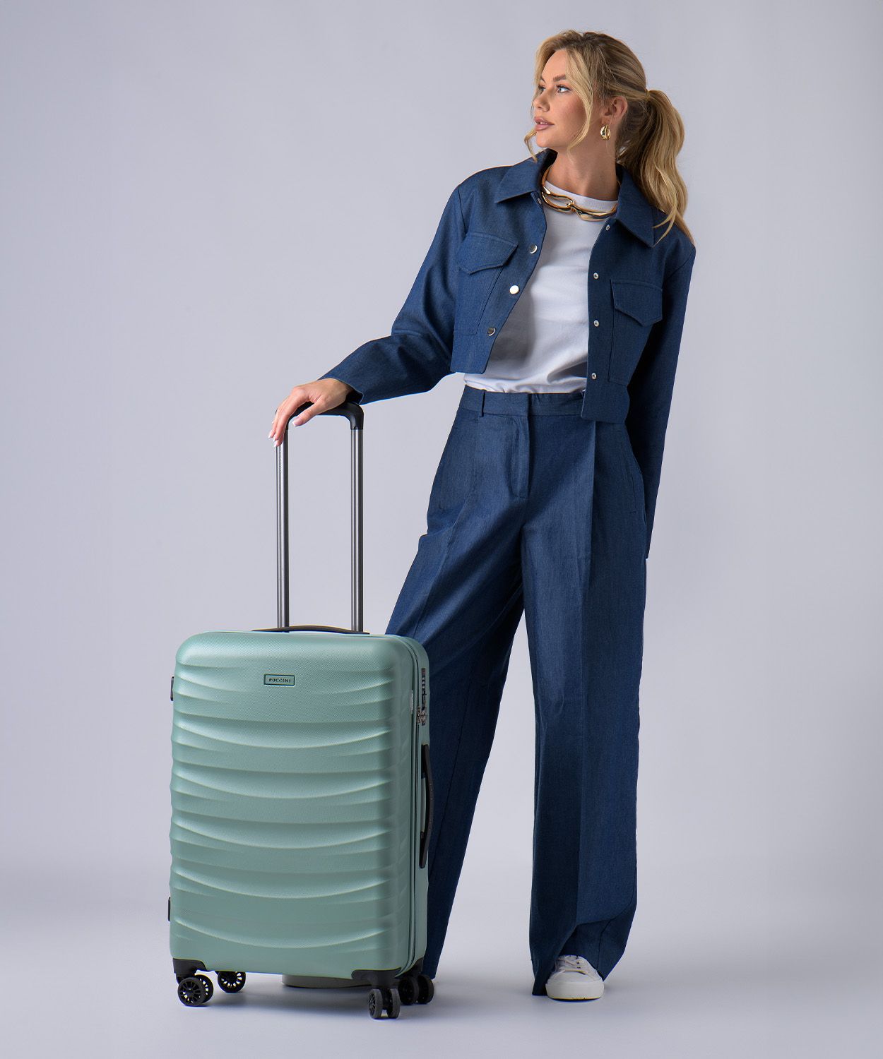 Stredný polykarbonátový kufor zelený